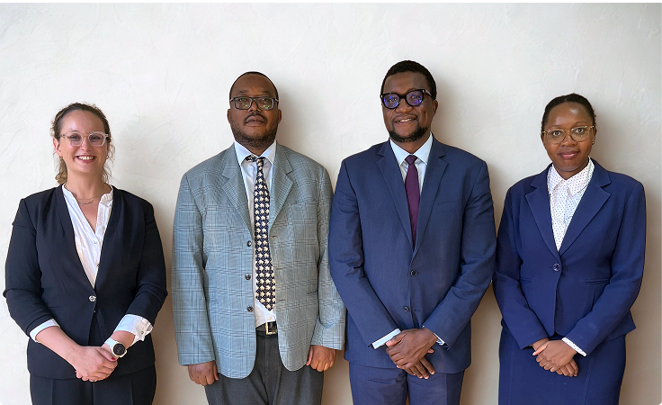 Malawi Ministry of Mining Principal Secretary (Mining Regulations), Marting Kaluluma Phiri, with CIJ team (from left) Dalit Cohen, Ron Chari and Liness Chikankheni in Lilongwe, Malawi, April 2025